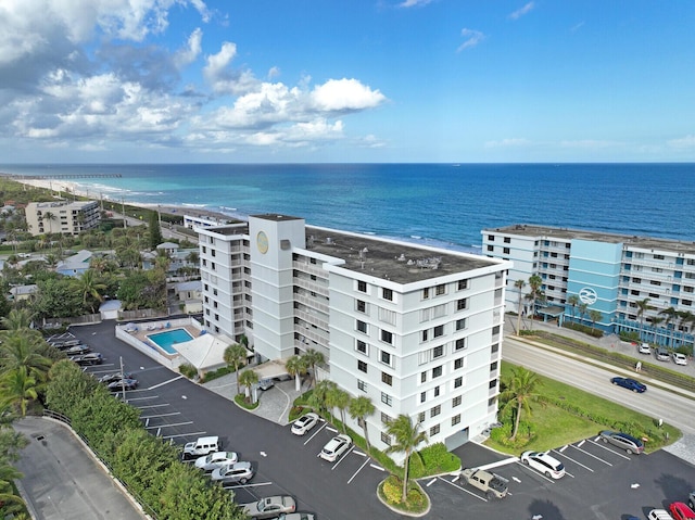 aerial view with a beach view and a water view