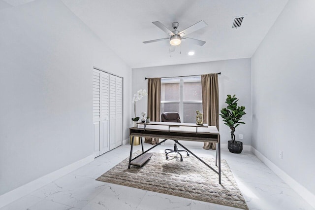 office with ceiling fan and vaulted ceiling