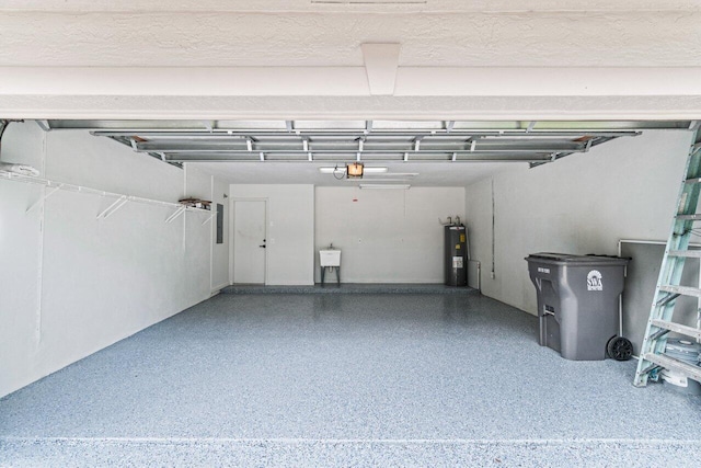 garage featuring a garage door opener and water heater