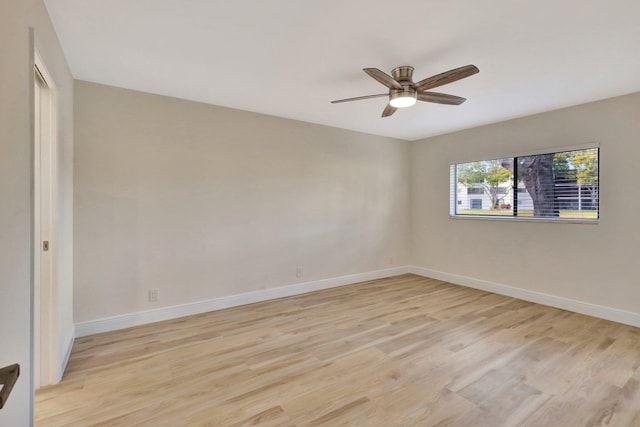 spare room with ceiling fan and light hardwood / wood-style flooring