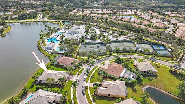 drone / aerial view with a water view