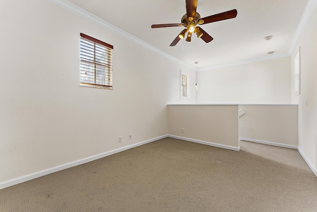 empty room featuring ornamental molding, ceiling fan, and carpet flooring