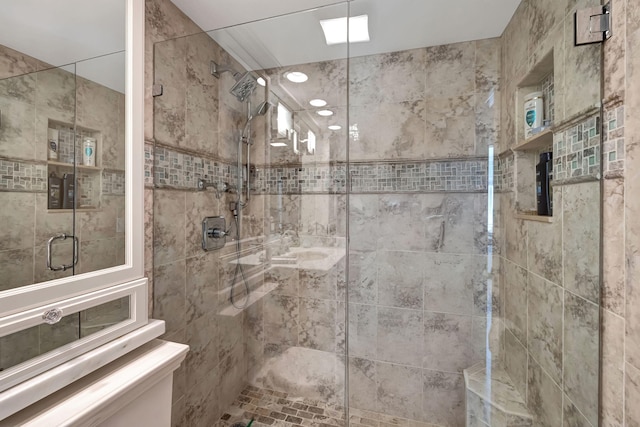 bathroom featuring an enclosed shower