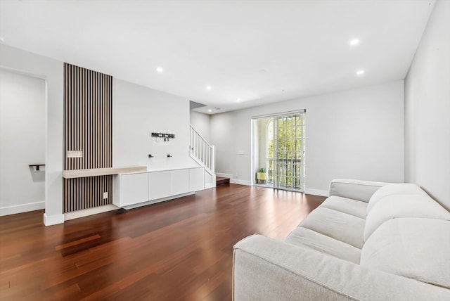 living room featuring dark hardwood / wood-style flooring