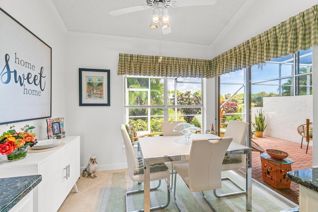 dining room featuring light tile patterned floors, a textured ceiling, vaulted ceiling, and ceiling fan