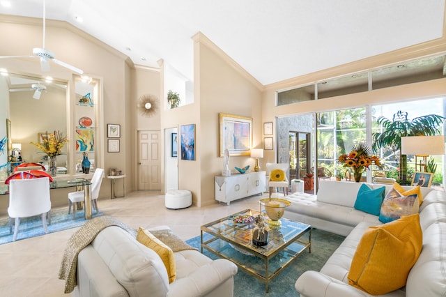 tiled living room featuring ceiling fan and high vaulted ceiling