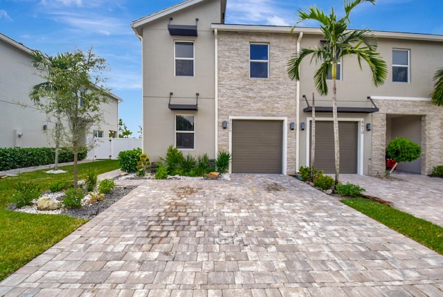 view of front of property featuring a garage