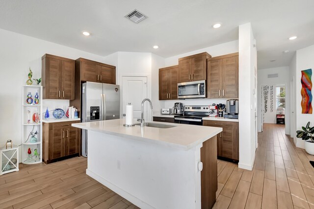 living area with light hardwood / wood-style flooring and ceiling fan