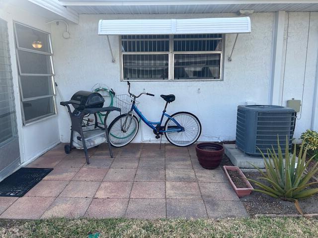 view of patio featuring central AC unit