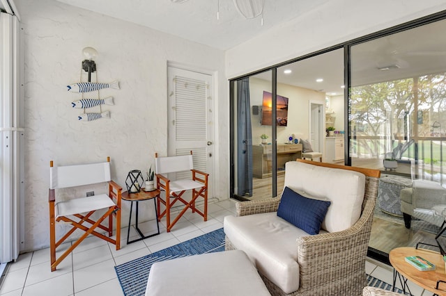 sitting room featuring light tile patterned flooring