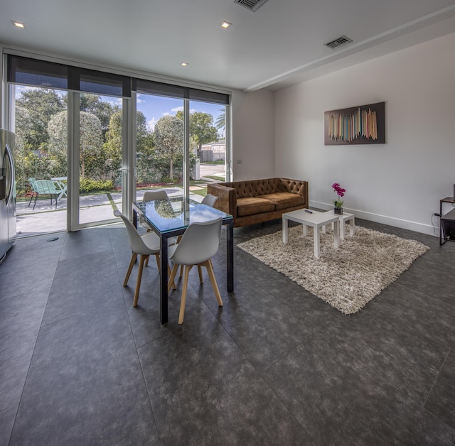 dining room featuring expansive windows