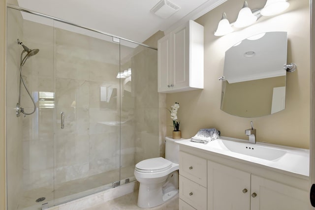 bathroom with ornamental molding, vanity, a shower with shower door, and toilet