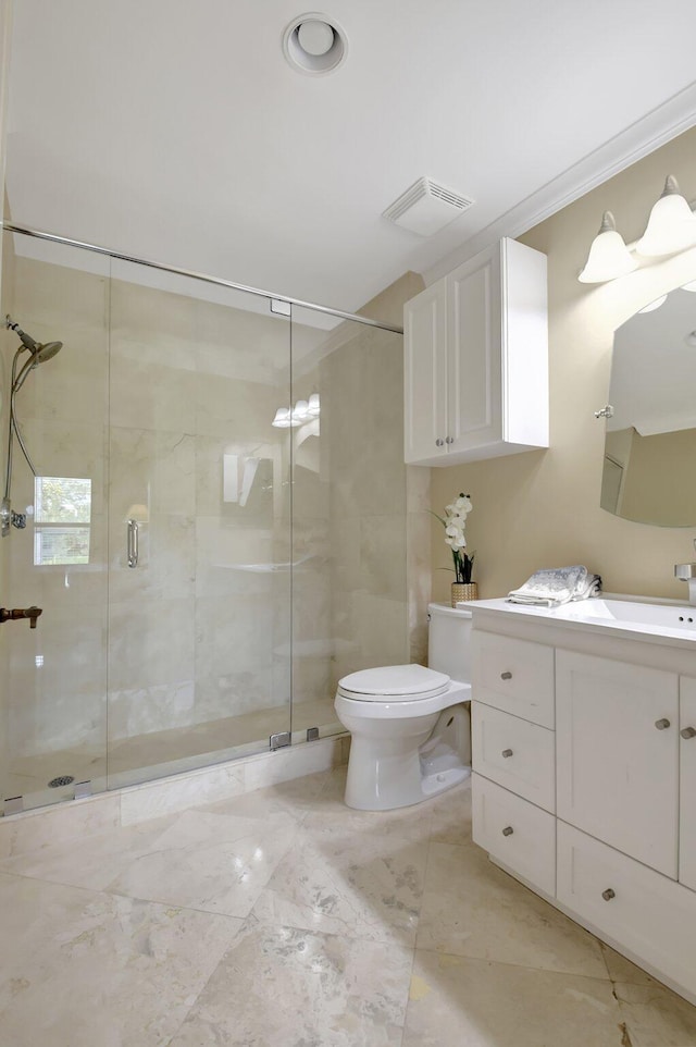 bathroom with walk in shower, vanity, and toilet