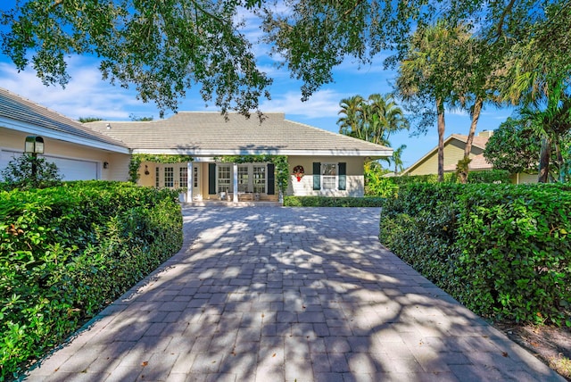 ranch-style house with french doors