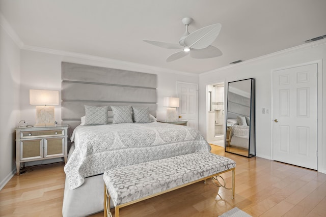 bedroom featuring ceiling fan, light hardwood / wood-style flooring, and crown molding