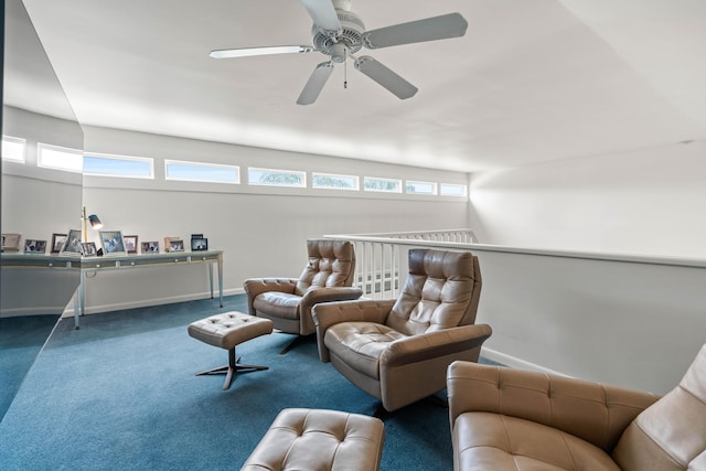 sitting room with carpet floors, ceiling fan, and a healthy amount of sunlight