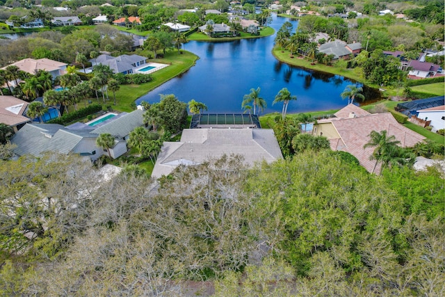 birds eye view of property featuring a water view