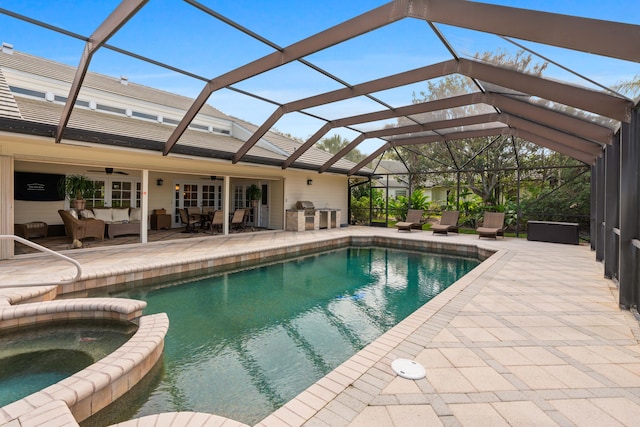 view of pool featuring an outdoor living space, ceiling fan, a patio area, and an in ground hot tub