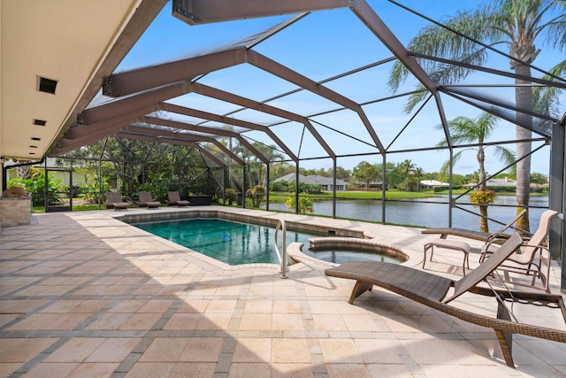 view of pool featuring glass enclosure, a water view, an in ground hot tub, and a patio