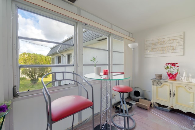 sunroom / solarium featuring plenty of natural light