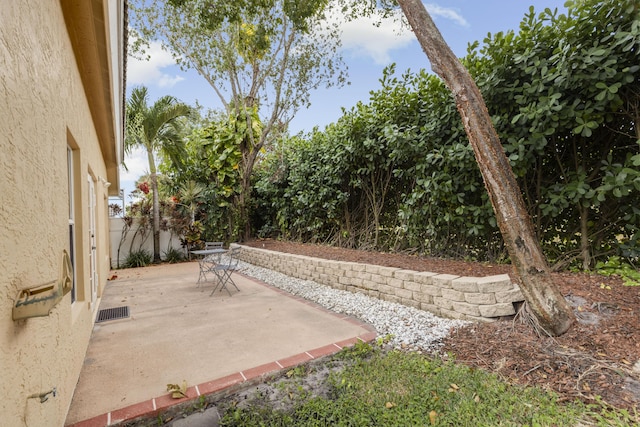 view of patio with fence