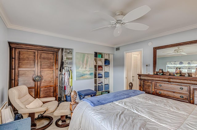 bedroom with a closet, ceiling fan, and ornamental molding