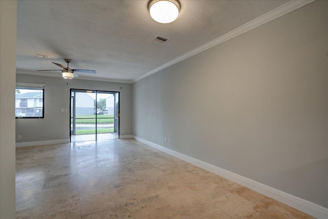 empty room with ceiling fan, ornamental molding, and a textured ceiling