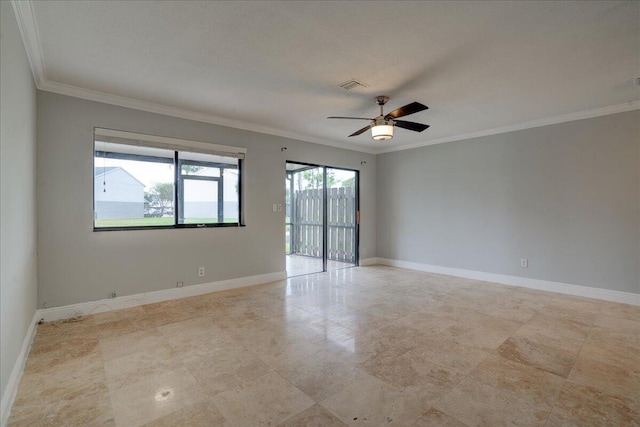 spare room with ceiling fan and crown molding