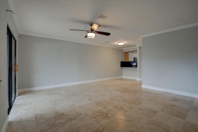 unfurnished room with ceiling fan and ornamental molding