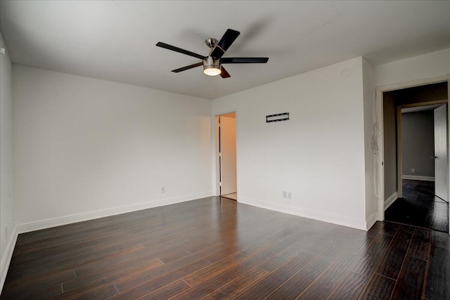 unfurnished room featuring ceiling fan and dark hardwood / wood-style floors