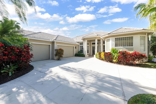 view of front of home with a garage