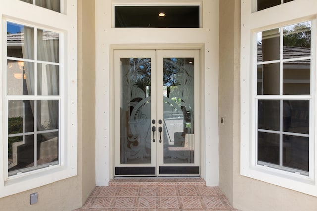 doorway to property featuring french doors