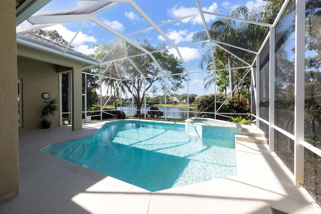 view of swimming pool featuring an in ground hot tub, a water view, a patio, and a lanai