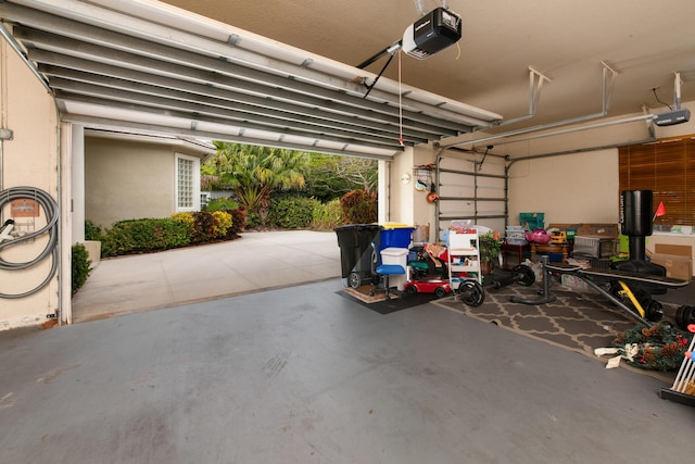 18640 SE River Ridge Rd, Jupiter, FL 33469 - garage with a garage door opener