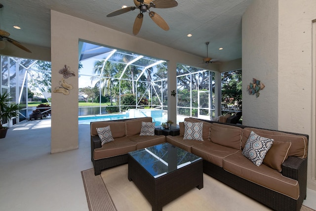 sunroom / solarium with a healthy amount of sunlight and a swimming pool