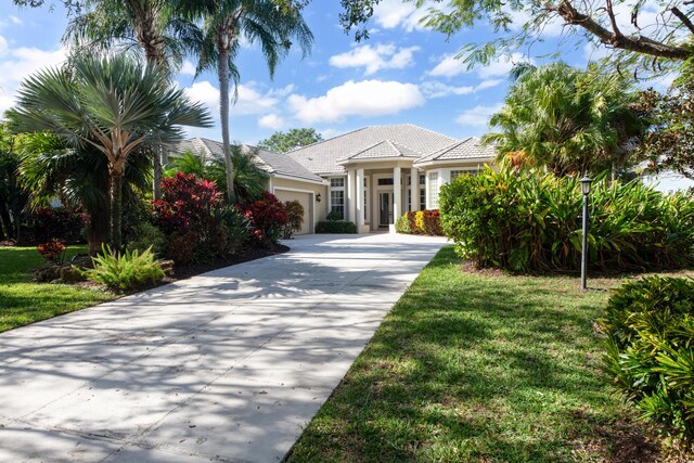 single story home featuring a garage