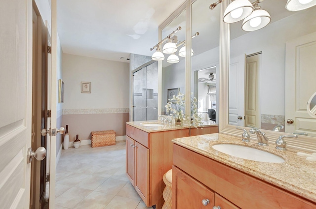 bathroom with separate shower and tub, ceiling fan, tile patterned flooring, and vanity