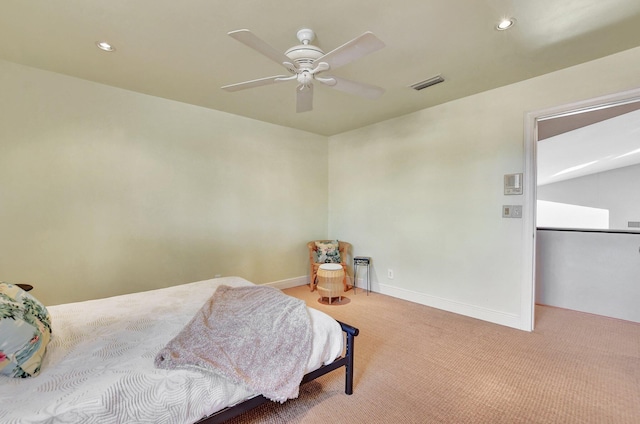 carpeted bedroom with ceiling fan