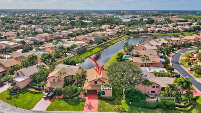 bird's eye view with a water view