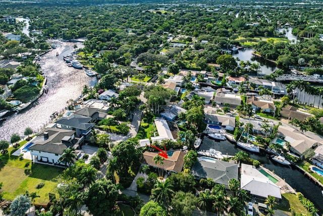 bird's eye view with a water view and a residential view