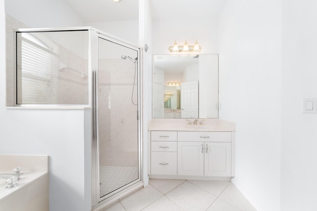 bathroom with separate shower and tub, tile patterned flooring, and vanity