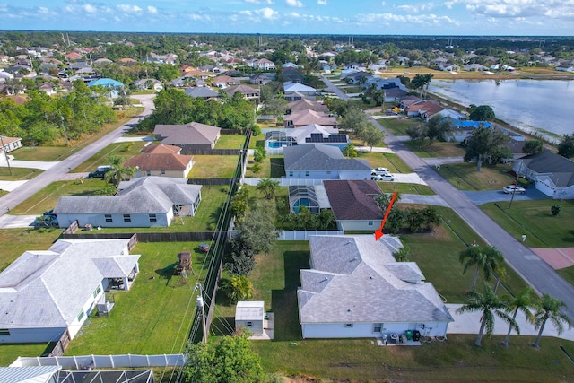 drone / aerial view featuring a water view