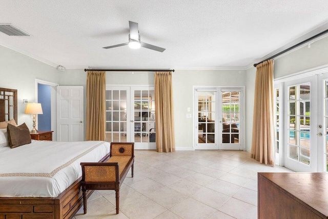 bedroom featuring access to outside, ceiling fan, french doors, and a textured ceiling