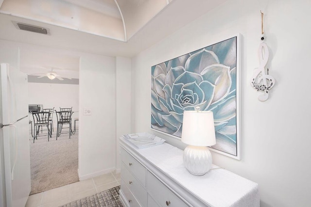 bathroom with tile patterned floors and ceiling fan