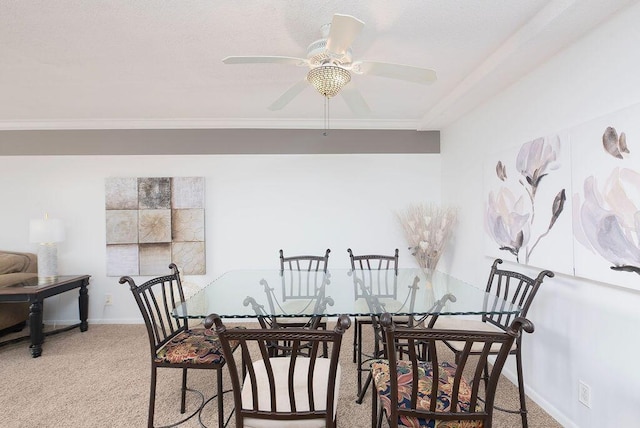 dining room with carpet floors and ceiling fan