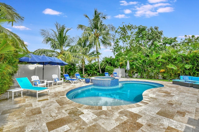 view of swimming pool with an outdoor hangout area, a patio area, and an in ground hot tub