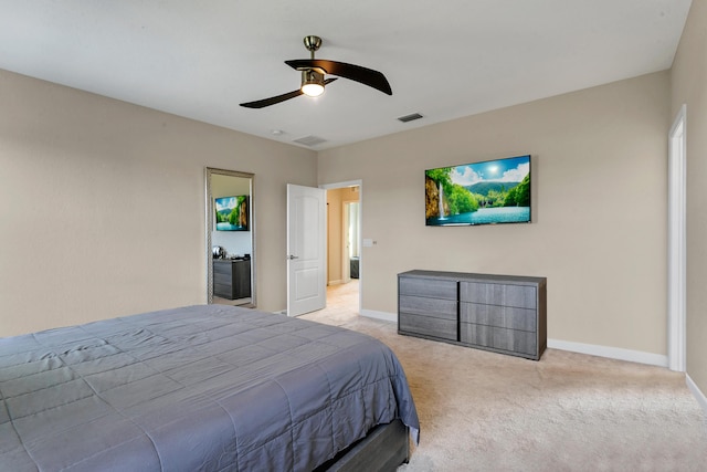 bedroom with light carpet and ceiling fan