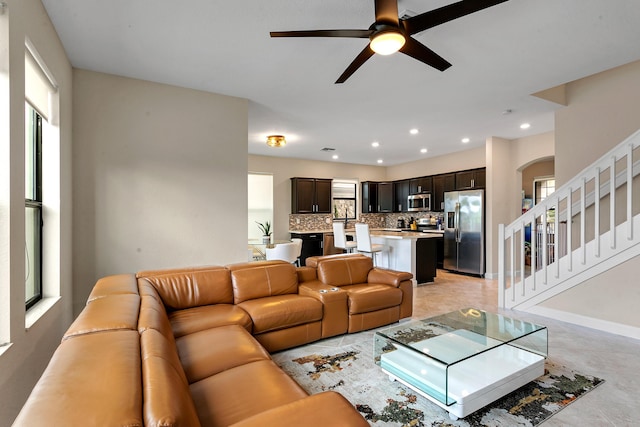 living room featuring ceiling fan