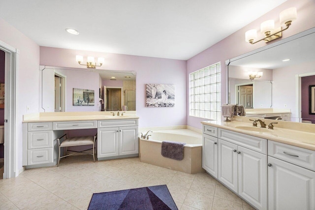 bathroom featuring a chandelier, vanity, independent shower and bath, and tile patterned flooring