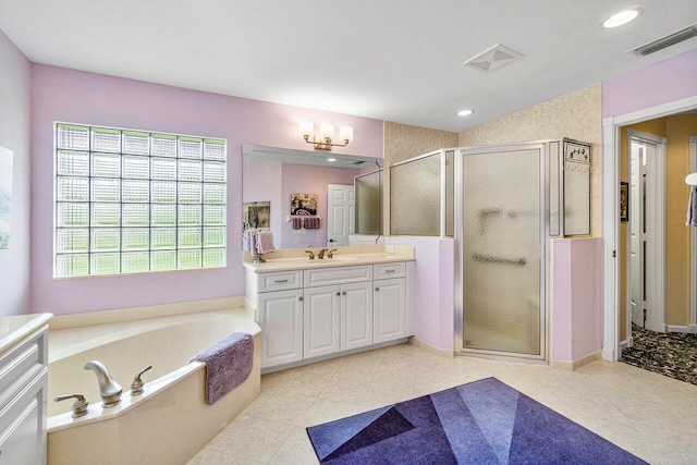 bathroom with separate shower and tub, tile patterned floors, and vanity